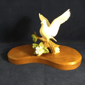 Porcelain Dove Figurine on wood base